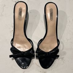 Prada 2.5 Inch Black Patent Leather Bow Heels. These Shoes Are Gorgeous. Classic Elegance+ Timeless (Will Never Go Out Of Style). Size 42/ 12. Wears More Like A 11 Or 11.5. Very Versatile. Could Be Worn With Evening Attire, Black Slacks For The Office Or With Jeans. Great Addition To Your Wardrobe. Blemish On Left Heel, Not Very Noticeable (Photo Included). Luxury Patent Leather Kitten Heels For Formal Occasions, Luxury Patent Leather Kitten Heels For Party, Formal Patent Leather Open Heel Kitten Heels, Formal Open Heel Patent Leather Kitten Heels, Luxury Black Kitten Heels For Party, Classic Patent Leather Kitten Heels For Party, Classic Party Patent Leather Kitten Heels, Luxury Black Kitten Heels For Evening, Elegant Black Patent Leather Kitten Heels