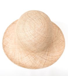 "\"Pina\" is a light summer sun hat with a wide flared brim. The shapely curve of the brim ensures a perfect fit and underlines a clear, feminine look. The material \"Bao\" made of the undyed fibres of the baobab tree is pleasantly permeable to air and ensures maximum wearing comfort. Available in sizes 55 cm - 60 cm. Colour \"nature\" Hat of \"Bao\" - Monkey bread tree Grosgrain ribbon (inside) made of 66% cotton and 34% polyamide Handmade Individualization options Other colours or sizes on req Eco-friendly Brimmed Sun Hat For Vacation, Spring Eco-friendly Brimmed Sun Hat, Eco-friendly Brimmed Sun Hat In Beige, Beige Woven Sun Hat, One Size Fits Most, Eco-friendly Beige Straw Sun Hat, Bread Tree, Fedora Women, Summer Straw Hat, Mens Fedora