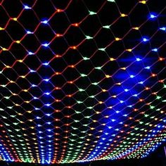 colorful lights are lit up on the ceiling