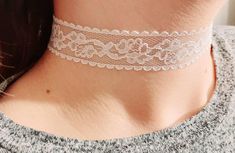 White Lace Choker Necklace A delicate floral lace choker that is beautiful and easy to wear. Perfect for spring or even a wedding. Adjustable extender for a perfect fit. Need a little help choosing a size? Measure your neck with a string then measure against a ruler.  *COLORS White  Ivory *SIZES  10 inches with a 3-inch extender (girls) 12 inches with a 3-inch extender (small) 14 inches with a 3-inch extender (medium to large) Width: 7/8 inches wide. Extender: 3 inches Lobster claw clasp  Made with white lace, a lobster claw clasp and a 3 inch extender comfortable fit. Arrives in a white organza gift pouch ready to gift. *SHIPS in 1-2 BUSINESS DAYS* Click here to get the SPARKLE BLACK VELVET CHOKER https://www.etsy.com/listing/969103880/sparkle-black-velvet-collar-choker Thank you for shop White Choker Necklace, White Lace Choker, Floral Choker, White Choker, Lace Choker Necklace, Velvet Necklace, Black Velvet Choker, Choker Collar Necklace, Lace Choker