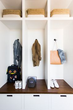 the closet is filled with shoes, coats and other things to wear for work or play