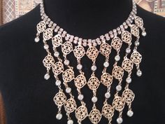 ON SALE Very nice statement bib rhinestone necklace in excellent vintage condition. Measures 18 in Long and the big portion is 7 in wide by 9 in Long. Very classy addition to any vintage jewelry collection. Perfect for a vintage wedding. Vintage Jeweled Necklaces For Wedding, Elegant Rhinestone Chain Necklace For Wedding, Elegant Rhinestone Wedding Chain Necklace, Elegant Wedding Chain Necklace With Rhinestones, Glamorous Wedding Chain Necklace, Costume Jewelry Rhinestone Necklace With Metal Jewels, Metal Rhinestone Necklace For Wedding Costume Jewelry, Metal Rhinestone Necklace For Weddings, Costume Jewelry Style, Costume Jewelry Metal Rhinestone Necklace For Wedding