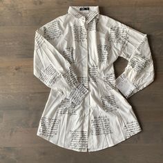 White Newspaper Print, Size Small, Dress/ Shirt. Can Be Worn With Leggings. Brand New Casual White Printed Shirt Dress, White Graphic Print Dress For Fall, White Long Sleeve Shirt Dress For Brunch, Trendy White Collared Shirt Dress, White Button-up Blouse With Graphic Print, White Graphic Print Button-up Blouse, Chic White Printed Shirt Dress, Chic White Fall Shirt, White Button-up Shirt Dress For Brunch