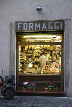 a motorcycle parked in front of a store