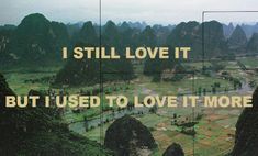 the words i still love it but i used to love it more are displayed in front of mountains