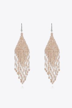 Beaded Dangle Earrings Elevate your style with our exquisite Beaded Dangle Earrings. These stunning accessories are the perfect blend of elegance and charm, meticulously crafted to complement any outfit. Key Features: Material: Made with high-quality beads for a sophisticated look. Measurements: 4.5 inches in length and 1.1 inches in width, ensuring an eye-catching dangle effect. Imported: Curated from exquisite international sources for premium quality. Care Instructions: Use a soft cloth: Afte Sophisticated Look, Butter Yellow, Beaded Dangle Earrings, Christmas Jewelry, Beaded Dangles, Spring Season, Elevate Your Style, Festive Christmas, Beaded Earrings