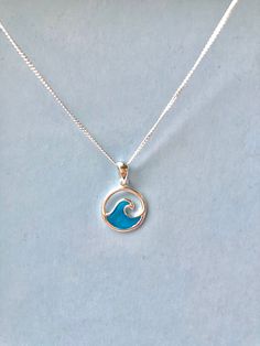 Ocean Wave Epoxy Resin Sterling Silver Necklace, Valentine's gift for her, Unique handmade pendant, nature inspired, nautical, cute gifts. IMPORTANT UPDATE: Please note that due to Brexit related delays from suppliers, all necklaces purchased in the next few weeks will be sent suspended from 16 inch sterling silver trace chains instead of curb chains as seen in the photo.  A lovely and dainty blue ocean wave necklace made from epoxy resin and 925 stamped sterling silver suspended from a curb nec Blue Charm Necklaces For The Beach, Personalized Ocean-inspired Jewelry Gift, Ocean-inspired Adjustable Charm Necklace Gift, Nature-inspired Necklaces With Charms For Gifts, Ocean-inspired Pendant Charm Necklace As Gift, Ocean-inspired Charms Necklaces For Gifts, Ocean-inspired Jewelry With Round Pendant For Gift, Blue Sterling Silver Charm Necklaces For Gifts, Ocean-inspired Charm Necklaces As Gift