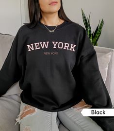 New York Sweatshirt, NY Crewneck, Trendy Preppy Shirt, Oversized New York Sweatshirt, Aesthetic Clothes, Womens Crewneck Ideal for any situation, a unisex heavy blend crewneck sweatshirt is pure comfort. These garments are made from polyester and cotton. This combination helps designs come out looking fresh and beautiful. The collar is ribbed knit, so it retains its shape even after washing. There are no itchy side seams on these sweaters.  .: 50% cotton, 50% polyester .: Medium-heavy fabric (8. Oversized Crew Tops With Letter Print, Oversized Crew Neck Top With Letter Print, Oversized Text Print Sweater For College, New York Pullover, Brandy Melville New York Sweatshirt, New York Black Sweatshirt, Modeling Clothes, New York Crewneck, New York Yankees Sweatshirt