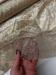 Shiny Glitter Sand fabric by yard Shining Ivory glued glitter lace fabric Blush Glitter Fabric Glitter fabric by the roll Wedding fabric Ivory, Blush, Light Blush, Blue, Red, Fuchsia,  Glued glitter lace fabric. This high quality fabric is ideal to tailor dreamy bridesmaid, wedding dresses, costumes and fashion accessories. My clients are using this fabric for sewing for a long time and they are very satisfied with the quality. ➡️ To see other glitter fabrics https://www.etsy.com/shop/StyleFabric?ref=seller-platform-mcnav§ion_id=25481787 *PRICE for length 1 meter = 39.4 inch = 1.09 yard = 27$ *WIDTH - 1.5 meter = 59 inches = 1.64 yard *COLORS Please choose the color in drop down menu. *Shipping company: Ukrpochta, DHL Express Worldwide. Please provide your phone number for a smooth and on Champagne Glitter Sequin Fabric For Wedding, Gold Sequin Fabric With Glitter For Weddings, Gold Shimmer Sequin Fabric For Wedding, Luxury Gold Elegant Tulle Fabric, Festive Gold Sparkling Sequin Fabric, Glamorous Gold Sequin Fabric, Luxury Gold Sparkling Sequin Fabric, Luxury Gold Glitter Sequin Fabric, Wedding Tulle