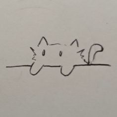 a drawing of a cat with its head on the edge of a piece of paper