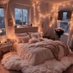 a bedroom with lights and fur on the bed