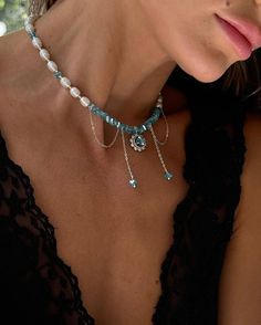 Add a touch of elegance and charm to your outfit with this stunning Shiny Perl Jewelry Set! This beautiful set includes a mesmerizing Blue Cristall Choker Necklace and matching Bracelet, perfect for adding a pop of color to any look. Whether you're a bride looking for your Something Blue or searching for a special Birthday Gift for Her, this set is sure to impress. Handcrafted with care and attention to detail, this jewelry set is a versatile addition to any jewelry collection. Make a statement and stand out with this one-of-a-kind set that shines with sophistication and style. An elegant necklace made of pearls, jewelry glass beads and cubic zirconia An exciting combination of tenderness and shine! This exquisite necklace will become a real decoration of your jewelry collection. A sophist Blue Pearl Jewelry For Party, Party Pearl Jewelry In Blue, Party Pearl Beaded Necklace With Pearl Pendant, Party Pearl Beaded Necklaces With Pearl Pendant, Elegant Blue Beaded Pearl Necklace, Party Beaded Pearl Necklaces With Pearl Pendant, Blue Pearl Beaded Necklace For Party, Elegant Pearl Necklace For Birthday, Elegant Pearl Necklace For Birthdays