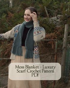 a woman is wearing a scarf and talking on her cell phone with the text moss blanket - luxury scarf crochet pattern pdf