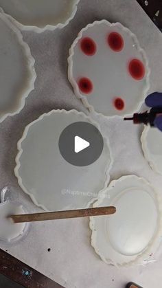 the process of making pies is being performed by someone using a pair of scissors