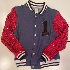 Jean Bomber Jacket With Red Sequin Sleeves. Never Worn. Red Outerwear For School In Fall, Red Hooded Varsity Jacket For Winter, Red Hooded Varsity Jacket For Fall, Hooded Red Varsity Jacket For Winter, Red Winter Outerwear For School, Red Hooded Outerwear For School, Red Patchwork Long Sleeve Varsity Jacket, Urban Red Long Sleeve Varsity Jacket, Red Military Long Sleeve Outerwear