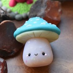 there is a small toy mushroom on the table