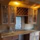 a blurry image of a kitchen with wooden cabinets