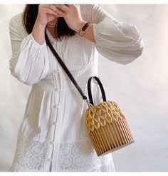 Elena Handbags Summer Bamboo Bucket Shoulder Purse Elegant Natural Color Shoulder Bag, Chic Formal Rectangular Straw Bag, Chic Rectangular Straw Bag For Formal Occasions, Elegant Straw Bag With Bamboo Handle, Elegant Formal Woven Bags, Luxury Gold Shoulder Bag With Bamboo Handle, Elegant Bucket Straw Bag With Detachable Handle, Evening Rectangular Straw Bag With Bamboo Handle, Rectangular Straw Bag With Bamboo Handle For Evening