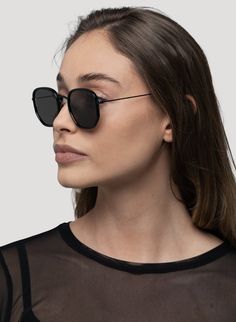 HEXAGONAL METAL SUNGLASSES IN BLACK PRODUCT DETAILS Frame: Hexagonal Metal Color: Black with a Metal Frame Lens: Smoke #CAT3 100% UV Protection Comes with a Soft Cream Vegan Case SIZE CM INCHES FRAME WIDTH 14.3 CM 5.6" FRAME HEIGHT 4.6 CM 1.8" LENS WIDTH 5.1 CM 2" LENS HEIGHT 4.2 CM 1.6" Sleek Black Sunglasses With Metal Frame, Minimalist Black Sunglasses With Metal Frame, Trendy Black Sunglasses With Metal Frame, Trendy Black Metal Frame Sunglasses, Casual Black Sunglasses With Metal Frame, Minimalist Black Sunglasses With Mirrored Lenses, Black Square Frame Sunglasses With Metal Frame, Minimalist Black Sunglasses With Uv Protection, Black Square Frame Metal Sunglasses