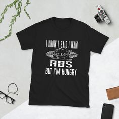 a t - shirt that says i know i said i want abs but i'm hungry