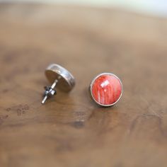 The perfect pair of Spiny Oyster Post Earrings for that pop of color - red/orange Spiny Oyster Simple Post Earrings Posts are a staple of the jewelry wardrobe, and these Beautiful, Sterling Silver, orangy-red Spiny Oyster Posts will be a favorite pair!! These posts are big, natural, high-grade, Spiny Oyster (10mm), simply, bezel set in .925 sterling silver. The big size of the stones gives these earrings a real and easy-to-wear presence. All traditional silversmithing is done in my Baltimore, MD Red Jewelry With Matching Earrings For Everyday, Red Everyday Earrings, Nickel-free Red Earrings For Everyday, Red Nickel-free Earrings For Everyday Wear, Red Sterling Silver Earrings For Everyday, Coral Earrings For Gift, Red Hypoallergenic Earrings For Everyday Wear, Nickel Free Orange Earrings For Everyday, Nickel-free Orange Earrings For Everyday Wear