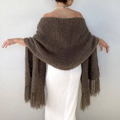 Wedding brown bridal shawl, taupe wrap, wool cover up, fall winter wedding, fringed evening scarf, bridesmaid gift,warm, rectangle This versatile taupe wrap piece not only complements any outfit but also provides warmth and protection from the chilly weather throughout fall, winter, and spring. These cover up's make an excellent bridesmaid gift. Fuzzy and warm yarn. it is not itchy at all. My proucts are handmade. MATERİAL: 10% mohair, 10% wool, 80% premium acrylic-Polyamid, COLOR:TAUPE (AS SHOW Elegant Fringed Shawl For Winter, Elegant Winter Shawl With Fringe, Elegant Fringed Shawl For Wedding, Elegant Fringe Shawl For Wedding, Winter Wedding Shawl Scarf, Winter Wedding Shawl, Brown Shawl, Evening Scarf, Evening Wraps