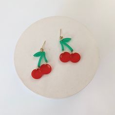 Cherry earrings are perfect for summer! gold plated stud posts acrylic 1.5 in x 1 in Trendy Nickel-free Resin Jewelry, Trendy Adjustable Drop Clip-on Earrings, Trendy Pierced Resin Jewelry, Trendy Resin Drop Earrings, Trendy Round Resin Jewelry, Trendy Resin Jewelry With Matching Earrings, Trendy White Resin Earrings, Trendy Drop Clip-on Earrings As Gift, Trendy Pierced Earrings For Gifts