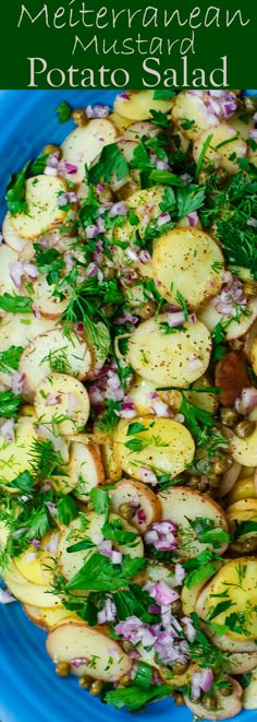 a blue plate topped with potatoes and herbs