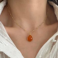 ✔️Raw Carnelian Pendant in a Satellite chain✔️ This is a Real carnelian necklace with a Natural carnelian crystal. Are your looking for  Birthday gifts or for a  Gemstone necklace for you? This natural carnelian crystal necklace is a great idea.  You will love this bright orange color of nature. High-Quality 925 Sterling Silver * Finish 24K Gold  A unique raw carnelian necklace. This natural carnelian pendant  is great for wearing alone or layered with other stacking necklaces. It is the perfect Elegant Orange Agate Necklace, Orange Gemstone Pendant Necklace, Orange Gemstone Drop Jewelry, Orange Drop Gemstone Jewelry, Orange Pendant Necklace With Birthstone, Orange Necklace With Adjustable Chain For Gift, Orange Necklace With Adjustable Chain As Gift, Orange Birthstone Pendant Necklace, Carnelian Gemstone Drop Jewelry