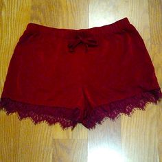 Red/Maroon Shorts Lace Trim Never Worn Size Small Red Short Bottoms For Loungewear, Red Shorts For Loungewear, Burgundy Short Bottoms For Summer, Burgundy Shorts For Summer, Summer Burgundy Shorts, Red Pajama Shorts For Loungewear, Red Lounge Shorts, Red Loungewear Shorts, Burgundy Summer Shorts