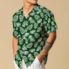 Introducing our Hawaiian Shirt for men, featuring vibrant floral patterns and a comfortable button-up design, perfect for the travel-loving boho enthusiast. This retro vacation wear blends style and comfort effortlessly, making it an ideal casual button-down choice for those seeking laid-back charm with a touch of nostalgia. 𝐃𝐄𝐓𝐀𝐈𝐋𝐒 🌴95% Polyester | 5% Spandex 🌴Boxy fit, straight cut 🌴Runs large, check your measurements against size chart 🌴Includes Chest Pocket 🌴Colors may appear dif Green Hawaiian Button-up Shirt, Printed Shirt For Vacation With Casual Collar, Green Vacation Shirt With Casual Collar, Green Casual Collar Vacation Shirt, Green Collared Hawaiian Shirt With Floral Print, Green Floral Print Short Sleeve Hawaiian Shirt, Hawaiian Shirt With Buttons For Vacation, Hawaiian Floral Print Button-up Shirt, Hawaiian Vacation Shirt With Buttons