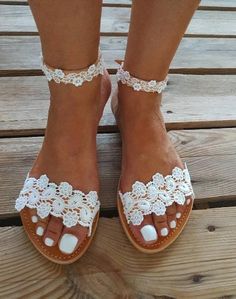 SHIPPING via DHL EXPRESS WORLDWIDE: 1 - 4 business days delivery (Please fill in your phone number if you choose Express Shipping) ★ More wedding sandals and shoes: See my store: https://www.etsy.com/shop/PelinoSandals 💓 Handmade genuine Greek leather wedding sandals decorated with romantic lace or crystals,pearls,rhinestones ( all the embellishments are hand sewn onto the leather straps) for brides dreaming of a beach wedding, a Bachelor party or even a city wedding. I am here to create with y Bridal Beach Sandals, Shoes Beach Wedding, White Sandals Wedding, Flat Sandals Wedding, Beach Wedding Sandals, Sandals Wedding, Leather Wedding, Handmade Sandals, Bridal Sandals