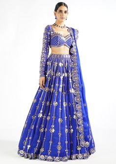 Fully embellished with real hand cut mirror and zari lehenga and dupatta with scallop border clubbed with a fully embellished mirror work blouse. Zari Lehenga, Royal Blue Lehenga, Embellished Lehenga, Vani Vats, Net Blouse, Lehenga Dupatta, Mirror Work Blouse, Floral Mirror, Georgette Dupatta