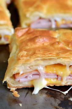 ham and cheese pastry is cut in half