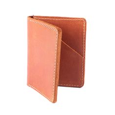 Leather wallets are a timeless accessory. Our Tom card wallet is handcrafted by skilled artisans with the highest quality sustainable leather. With a slim and functional design, this classic wallet can hold all the important cards you need without being bulky. Features 4" length x 3" width x 0.5" height x 6.5" open Credit card slots High quality leather from environmentally conscious and sustainable sources. Lifetime guarantee Artisan Card Holder For Everyday Use, Classic Trifold Wallet With Card Slots For Everyday, Classic Bifold Card Holder For Everyday Use, Rectangular Wallet With Interior Card Slots For Everyday, Trifold Wallet With Interior Card Slots For Everyday Carry, Everyday Carry Trifold Wallet With Interior Card Slots, Everyday Rectangular Wallet With Interior Card Slots, Classic Rectangular Everyday Card Holder, Rectangular Trifold Wallet With Interior Card Slots For Everyday