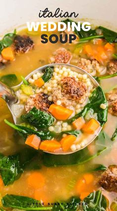 a spoon full of italian wedding soup with spinach and carrots