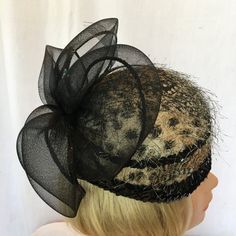 "Vintage Black Bowl Style Hat Covered by Fabric, Fibers and Sequins. Large Black Horsehair Bow. Black and Cream Background. Chin Strap. Fancy Hat. This hat is in good shape for its age. Wear for a wedding. Size: 7\" X 10\" With Bow, 22 1/2\" For other vintage and homemade items see: www.VeryVictorianStudio.etsy.com For sewing related items see my other shop: www.SewingRoomStore.etsy.com Thank you for looking!" Black Gatsby Fascinator For Evening, Black Gatsby Style Fascinator For Evening, Black Gatsby Style Hats For Evening, Black Cloche Mini Hat For Evening, Black Fascinator For Evening, Black Fitted Fascinator For Evening, Fitted Black Fascinator For Evening, Black Gatsby Style Fascinator, Fitted Black Cloche Mini Hats