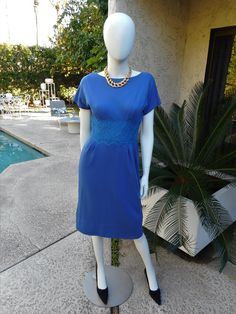 This is a blue knit dress. Fully lined. Zips and hooks up the back. Maker: Unknown Fabric content: Unknown Care: Unknown Condition: Good overall. There are several tiny repairs mostly along the hem line area but nothing too serious (see photo # 5 for examples) Size: 8 estimated (please refer to measurements) Measurements: (Laying on a flat surface, double where necessary) Underarm to underarm: 19 inches Waist: 13 1/2 inches Hips: 19 inches Skirt length: 24 1/2 inches Length: 41 inches Blue Knit Dress, Dress Clothes For Women, Skirt Length, Knit Dress, Overalls, Art Collection, Dress Outfits, Bathing Beauties, Womens Dresses