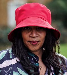 Why not look cheerful and turn heads on a miserable grey day?  This cheerful red bucket hat allows you to do exactly that!  It's handmade from lightweight & fully waterproof polyester - and folds away into its own bag, so can be with you at all time - just in case!It's a ladies rain hat with a medium 3 inch brim which gives you plenty of cover from a quick rainstorm.  Handmade in the UK, the hat is fully adjustable, so even those ladies with small heads can stay dry too!This is our EMMA #FoldInA Red Bucket Hat For Outdoor, Red Bucket Hat With Short Brim For Outdoor, Red Outdoor Bucket Hat With Short Brim, Red Brimmed Bucket Hat For Outdoor, Red Short Brim Bucket Hat For Outdoor, Red Wide Brim Bucket Hat For Outdoor, Red Bucket Hat, Packable Hat, Round Hat