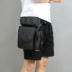 Waist and leg straps with an adjustable quick-release buckle as lightweight police Leg Tactical Bag or sling shoulder backpack. Compartments are designed for holding most belonging like mobiles phone, pens, cigarettes, wallets, cameras, carabineers, keys, flashing lights, power banks, and other camping items. The Waist Drop Leg Bag has 1 long adjustable strap, you can wear the bag on your shoulder. And 1 adjustable strap, you can fix the bag on your thigh. Ideal for travel, work, school, and other activities, works great as a gift! Ideal for riding, biking, cycling, horse, outdoor, camping, hunting, and other activities. Suitable for men and women, adults. Features: With two adjustable straps, one for the waist, and one for the leg. Fine workmanship and anti-wear,scratch-resistant. Smooth Multifunctional Anti-theft Chest Bag For Outdoor, Black Techwear Chest Bag With Multiple Pockets, Durable Techwear Chest Bag For Outdoor Activities, Techwear Chest Bag For Outdoor Activities, Techwear Chest Bag With Pockets For Outdoor Activities, Techwear Shoulder Bag With Pockets For Outdoor, Tactical Chest Bag With Pockets For Outdoor, Techwear Shoulder Bag With Pockets For Outdoor Activities, Black Chest Bag With Multiple Pockets For Outdoor