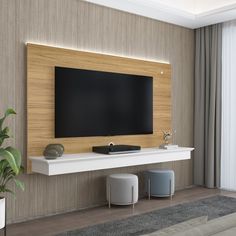 a flat screen tv mounted to the side of a wall