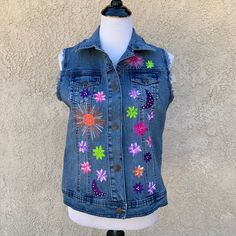 Nwt Diane Gilman Colorful Embroidery Blue Denim Vest Size: Small -Snap Buttons -Beautiful And Colorful Floral And Moon Embroidery In New With Tag Condition! Any Questions? Feel Free To Ask! Thanks So Much For Looking! Spring Festival Denim Blue Outerwear, Multicolor Denim Jacket For Spring, Spring Multicolor Denim Jacket, Multicolor Denim Summer Outerwear, Multicolor Patched Denim Jacket For Spring, Multicolor Denim Jacket With Patches For Spring, Blue Cotton Denim Jacket With Patches, Spring Blue Denim Vest, Spring Denim Outerwear With Multicolor Embroidery