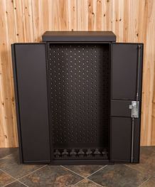 a black cabinet sitting on top of a tile floor next to a wooden wall with wood paneling