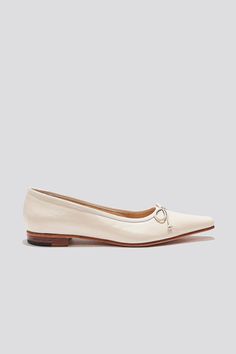 The Ema Bow Flat is the ZX interpretation of a classic pointed ballet silhouette. With a toe that is both pointed and squared, this style will express understated and modern femininity. Although we're big fans of wearing the Ema Ballet with the foundational pieces in our wardrobes, The Ema in Marfil makes a particularly stunning style for brides and wedding guests who want to channel a certain vintage chic for their wedding looks as well. Who it’s for: The woman who takes heavy style inspiration from French new wave films. Kidskin leather upper with vegetable tanned leather lining and a leather sole. Heel height: 18mm Handmade in Argentina Elegant Fitted Ballet Flats, Elegant Flats With Sculpted Heel Medium Width, Elegant Pointed Toe Fitted Ballet Flats, Elegant Fitted Pointed Toe Ballet Flats, Elegant Fitted Closed Toe Flats, Elegant Ballet Flats With Pointed Toe And Medium Width, Elegant Fitted Ballet Flats For Formal Occasions, Elegant Pointed Toe Ballet Flats For Work, Elegant Fitted Flats With Pointed Toe