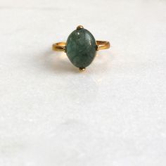 A stunning and large 13mm all natural green-blue moss aquamarine with a very high dome is prong set into a 22k gold over sterling vermeil setting. This stone absolutely glows from every single angle. The size is fully adjustable on the very comfortable band. An absolute one and only fine gemstone ring. Gold Oval Emerald Ring For Everyday Wear, Gold Emerald Ring With Natural Stones For Anniversary, Gold Emerald Ring With Large Oval Stone, Moss Aquamarine, Emerald Gem, Fringe Earrings, Saint Louis, 22k Gold, Gemstone Ring