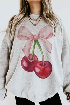 This Cute Cherry Sweatshirt is the perfect gift or outfit for any day. Its trendy, fun and cute for a day out. Soft girl era!!  This Pink ribbon Cherry day be trendy and cozy in our cherry heart with a ribbon sweatshirt.  Q U I C K * F A C T S * ♥️ 100% Soft cotton ♥️Design is high quality digital print ♥️ Wash and dry normally. Do not iron directly on the print. * S I Z I N G * ♥️ Sizing is unisex so runs like men's ♥️Most women find their typical size works best. ♥️ Please see size guide in la Sweet Long Sleeve Cotton Sweatshirt, Cute Graphic Print Long Sleeve Sweatshirt, Cute Long Sleeve Graphic Print Sweatshirt, Cute Long Sleeve Graphic Sweatshirt, Cute Sweatshirt For Spring Loungewear, Cute Long Sleeve Spring Sweatshirt, Sweet Crew Neck Top For Fall, Sweet Fall Crew Neck Top, Sweet Pink Long Sleeve Sweatshirt