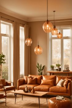 a living room filled with furniture and lots of windows