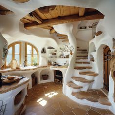 the interior of a house with stone stairs