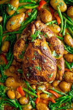 chicken, potatoes and green beans in a skillet