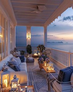 the balcony is decorated with candles and wicker furniture